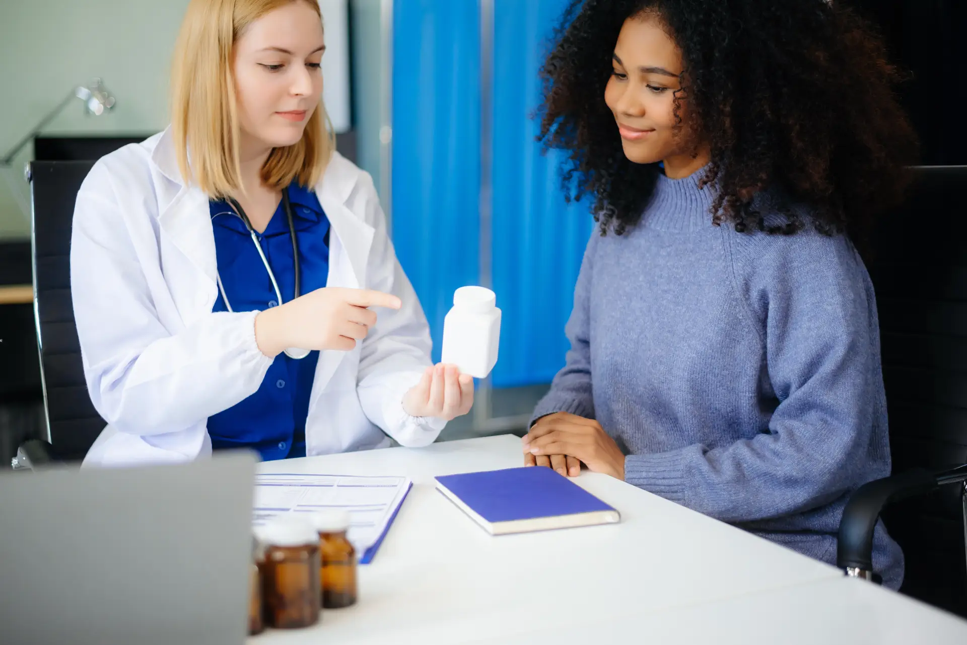 Doctor explaining Medication Assisted Treatment options to a patient, featuring a prescription bottle and counseling setting, emphasizing substance use disorder recovery.