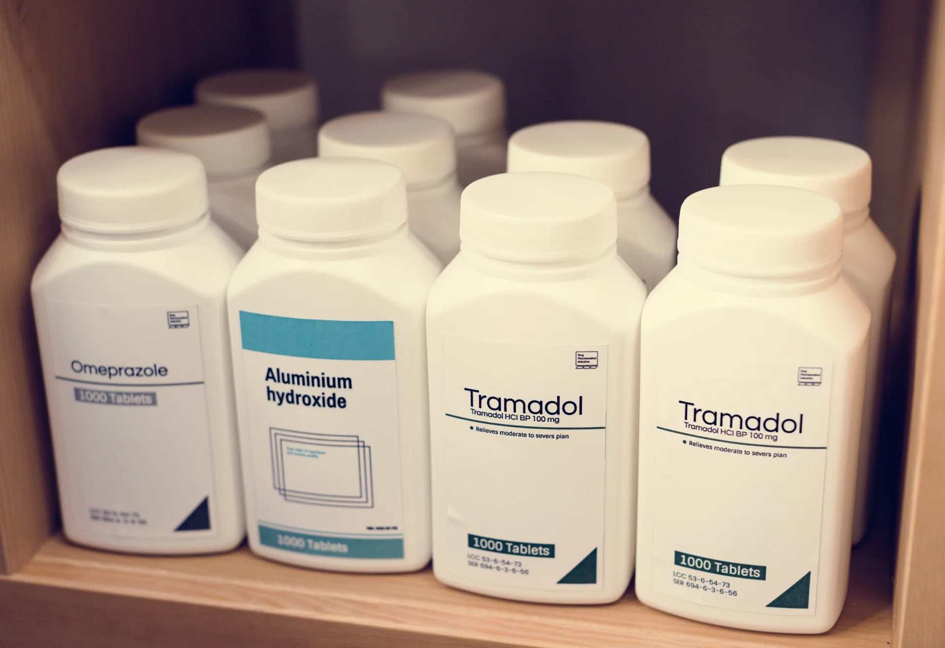 Bottles of tramadol and other medications, emphasizing tramadol's role in pain relief and addiction treatment, relevant to Long Island addiction recovery resources.